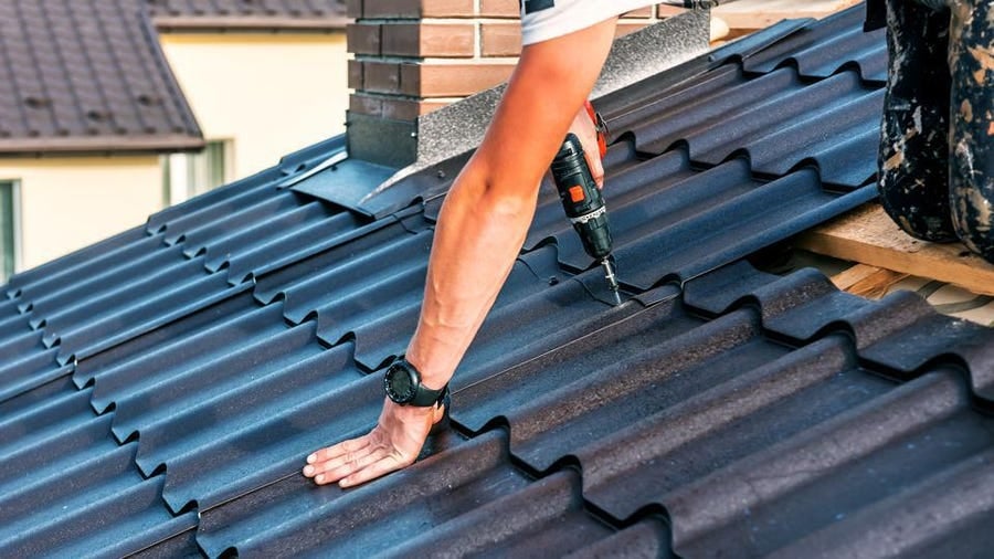 roofer installing meta roof in san antonio texas